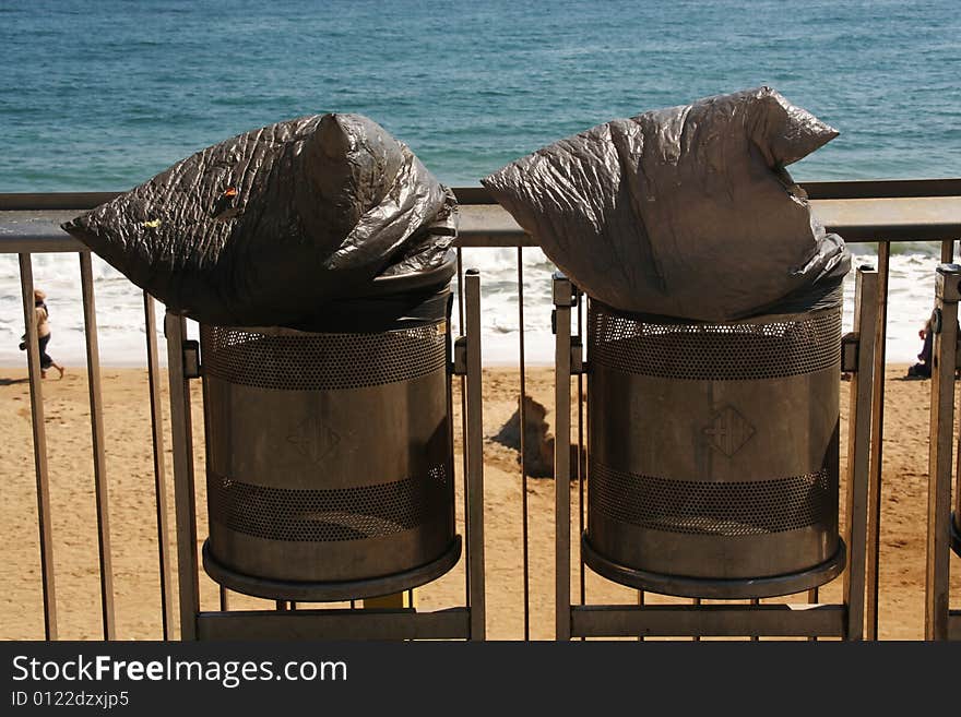 Two dust bins at barcelona beach. Two dust bins at barcelona beach