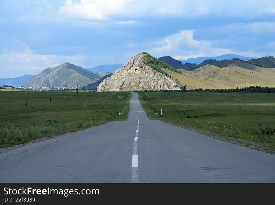 Landscape of road leaving in mountains. Landscape of road leaving in mountains