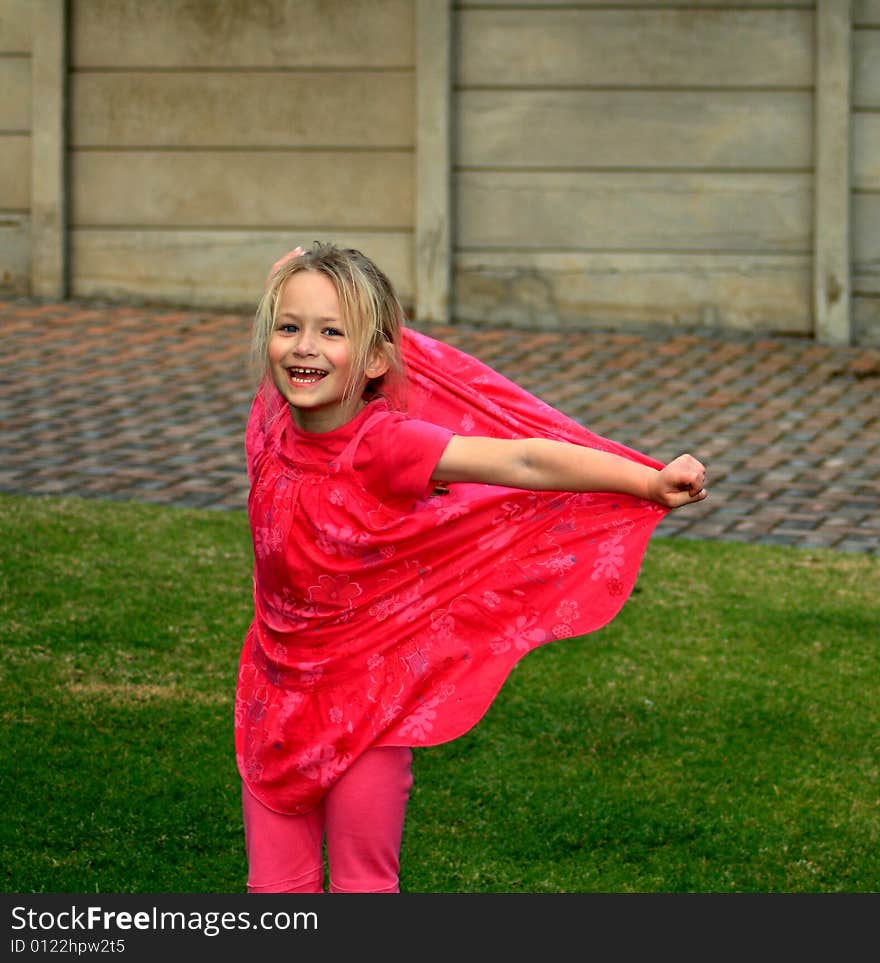 A beautiful white caucasian girl child with a joyful expression on her face. A beautiful white caucasian girl child with a joyful expression on her face