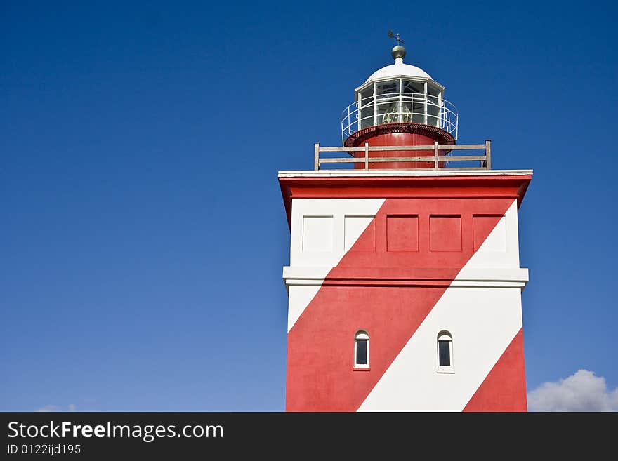 Red and white exterior of a lighthouse