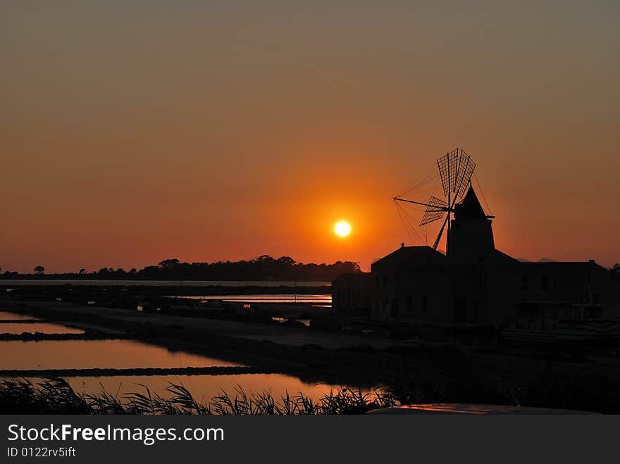 Sunset on the salt-works of Marsala in SIcily