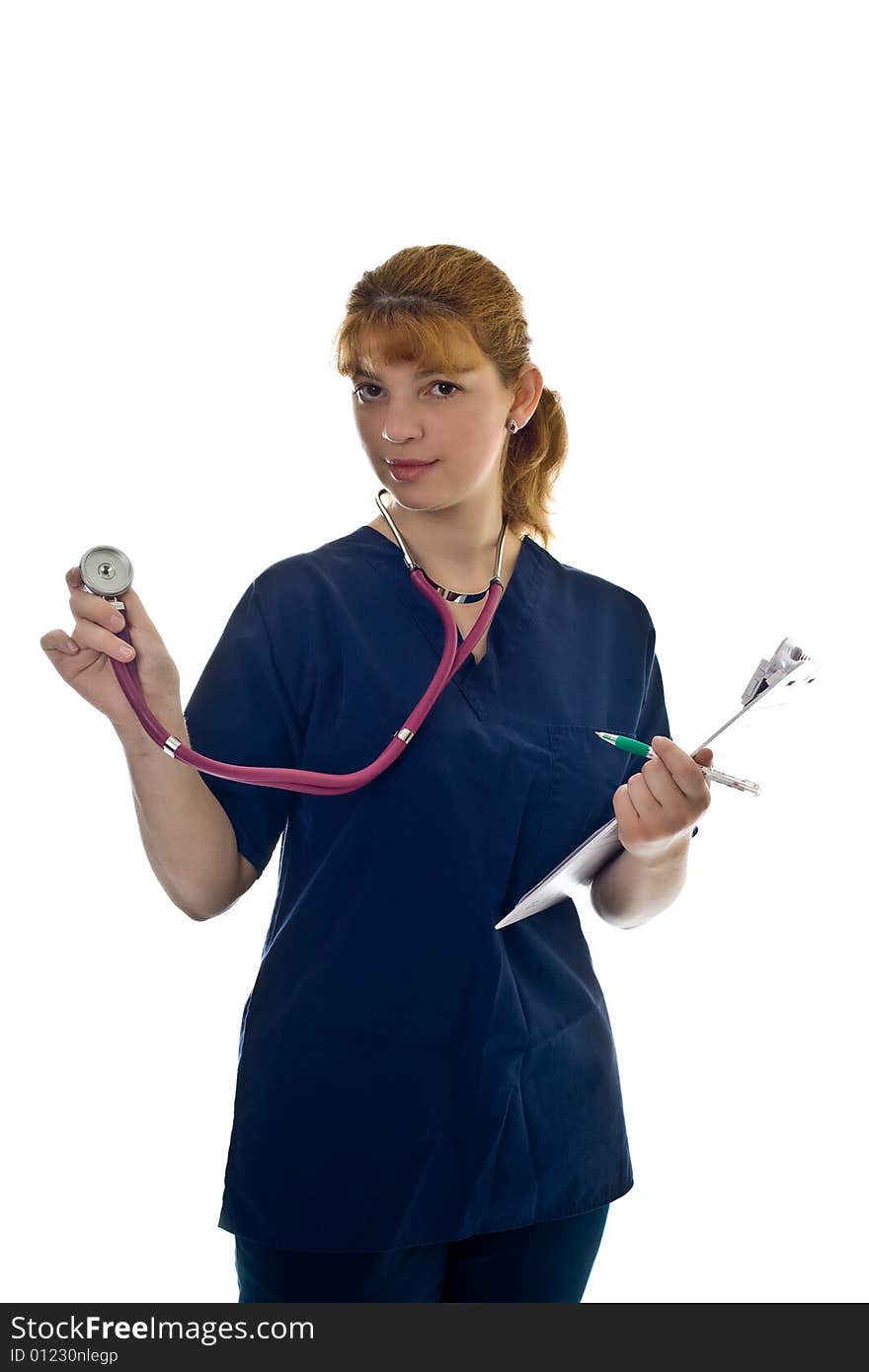 Young female doctor with stethoscope and writing pad over white background