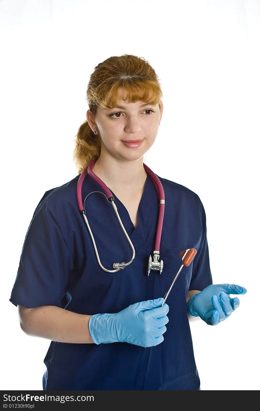 Young female doctor with stethoscope and neurological percussion hammer over white background