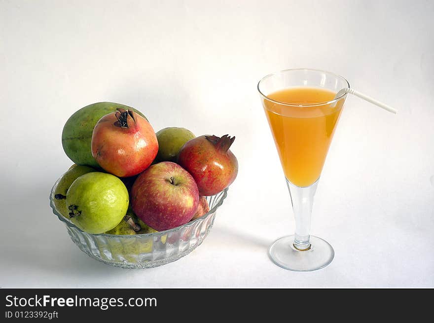 Still life with fruits & fruits juice on white background. Still life with fruits & fruits juice on white background.