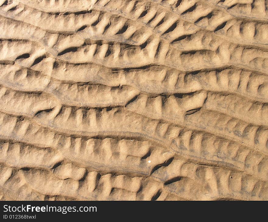 Pattern in sand  fading into he distance. Pattern in sand  fading into he distance