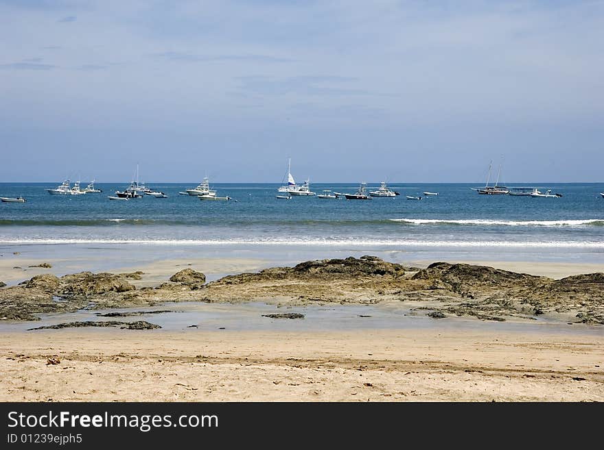 Boats and Sailboats on Blue Water