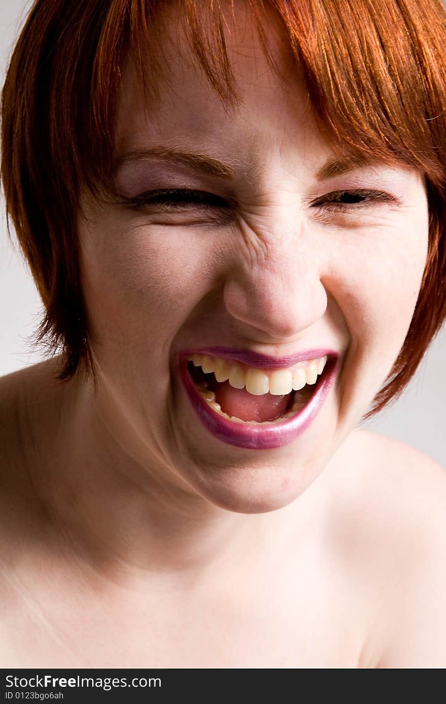 Red haired girl with emotive faces and expressions. Red haired girl with emotive faces and expressions