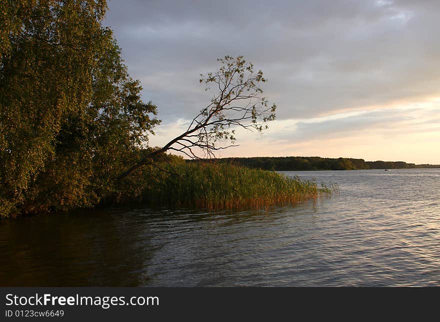 Large river Volga in the dusk with red sunlight