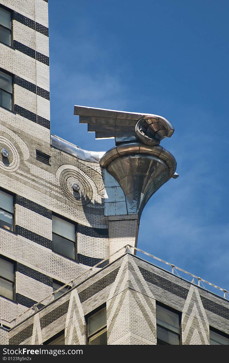 Chrystler Building Eagle against blue sky