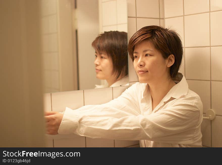 A girl in casual dress, taken at home. A girl in casual dress, taken at home.