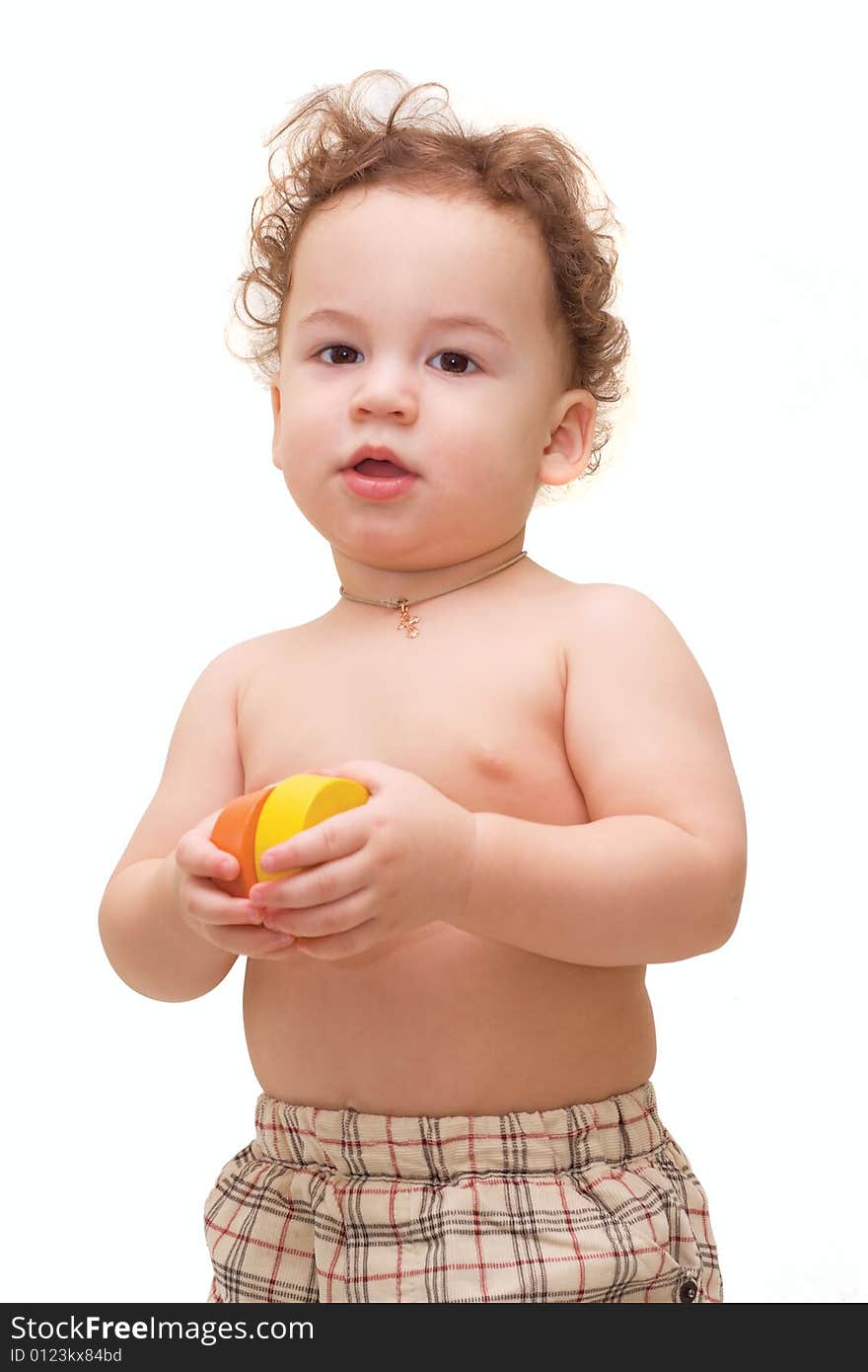 Small boy holding colorful toys in hand. Small boy holding colorful toys in hand