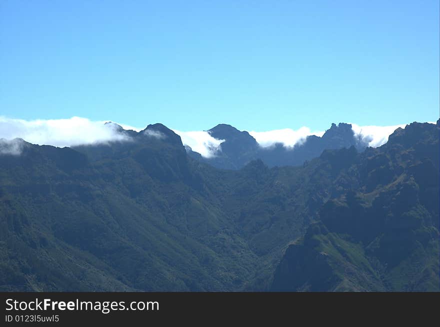 Clouds often collide against the mountains. Clouds often collide against the mountains.