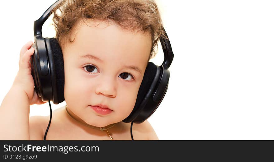 Boy in headphones looking at you attentively