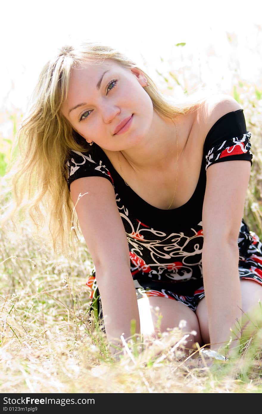 Pretty young girl on summer meadow. Pretty young girl on summer meadow