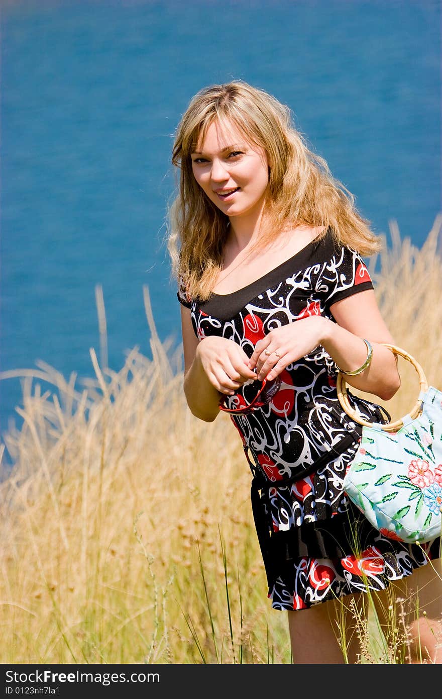 Young beautiful girl with bag