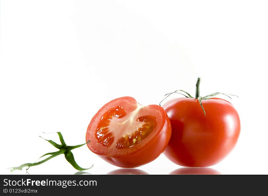 View of nice big red tomatoes  on white background. View of nice big red tomatoes  on white background