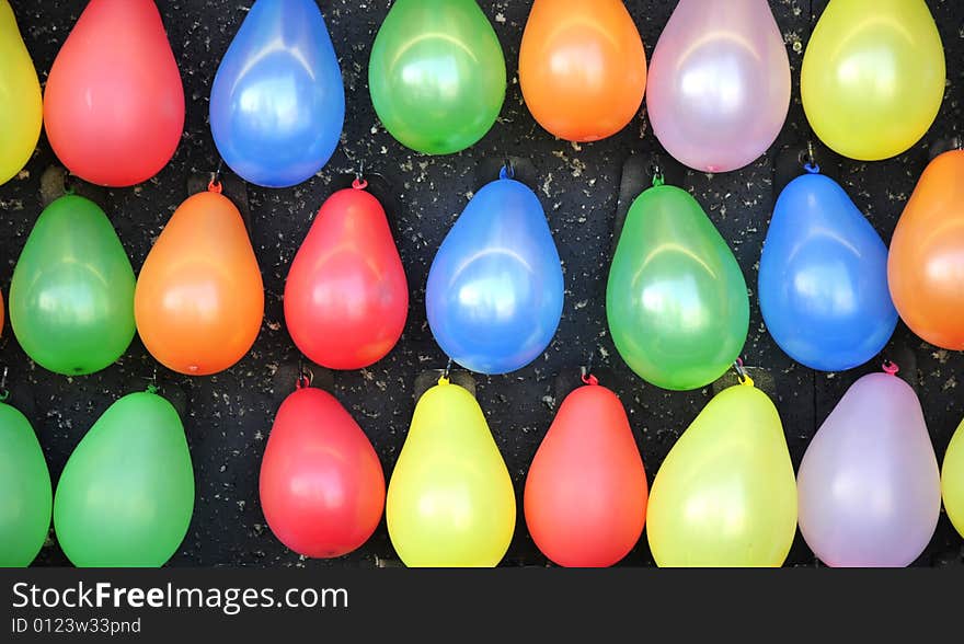 Colorful balloons at an amusement park.