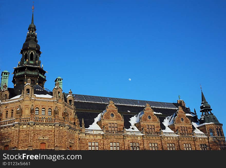 Nordic Museum in Stockholm Sweden with moon in background,. Nordic Museum in Stockholm Sweden with moon in background,