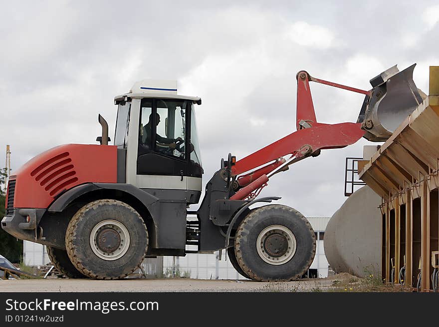 Big red bulldozer at work