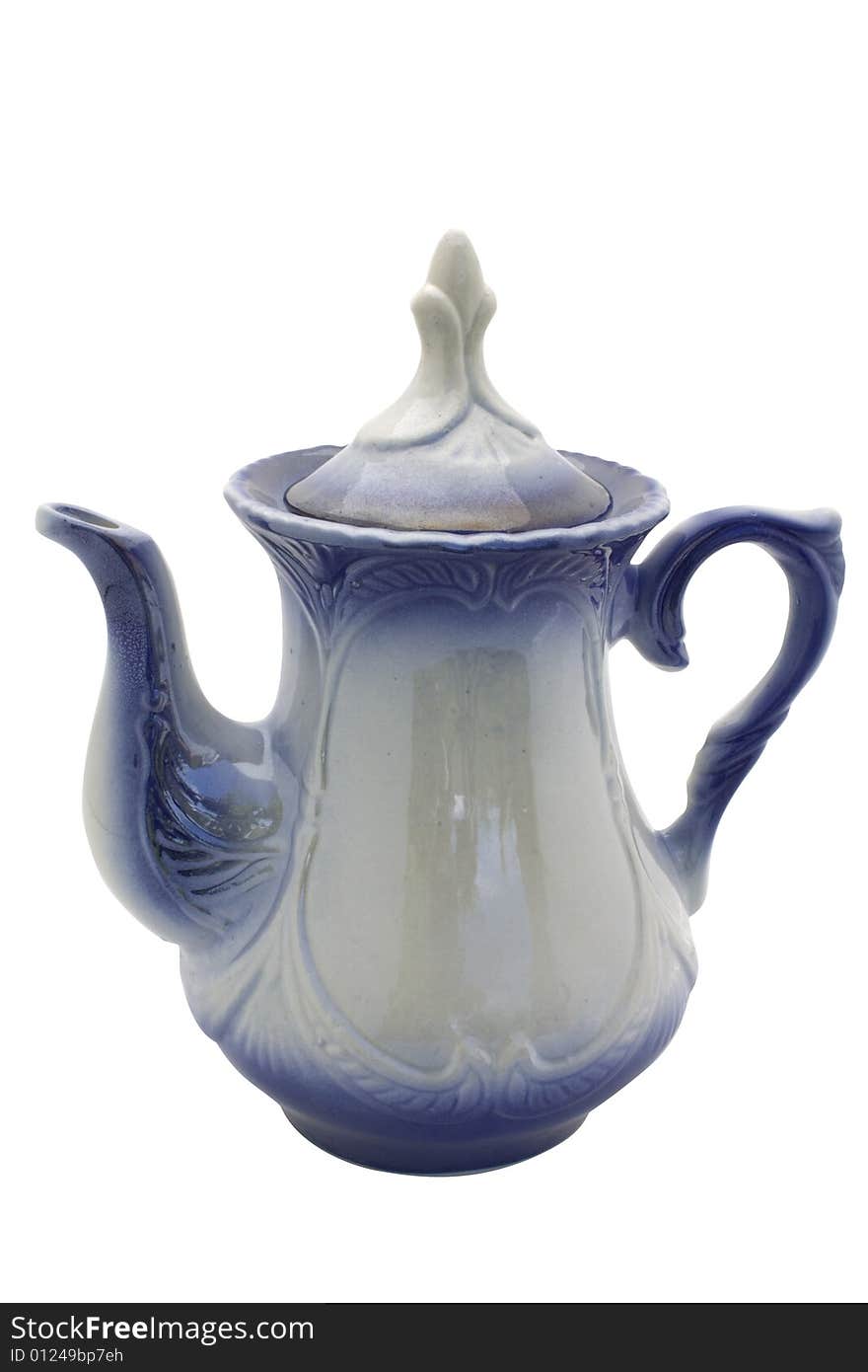 Ceramic teapot it is grey dark blue color with the closed cover on a white background it is isolated