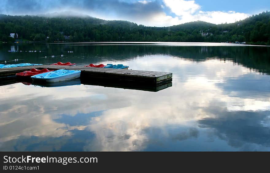 Quay on a smooth lake