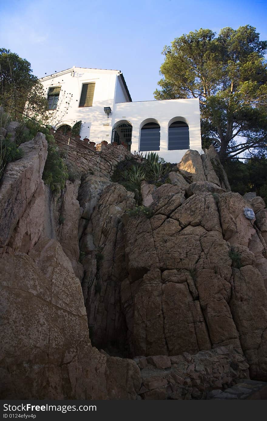 Cliff top Mediterranean beach-side holiday home