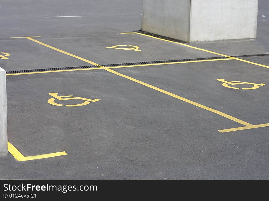 Yellow parking sign for handicapped people. Yellow parking sign for handicapped people