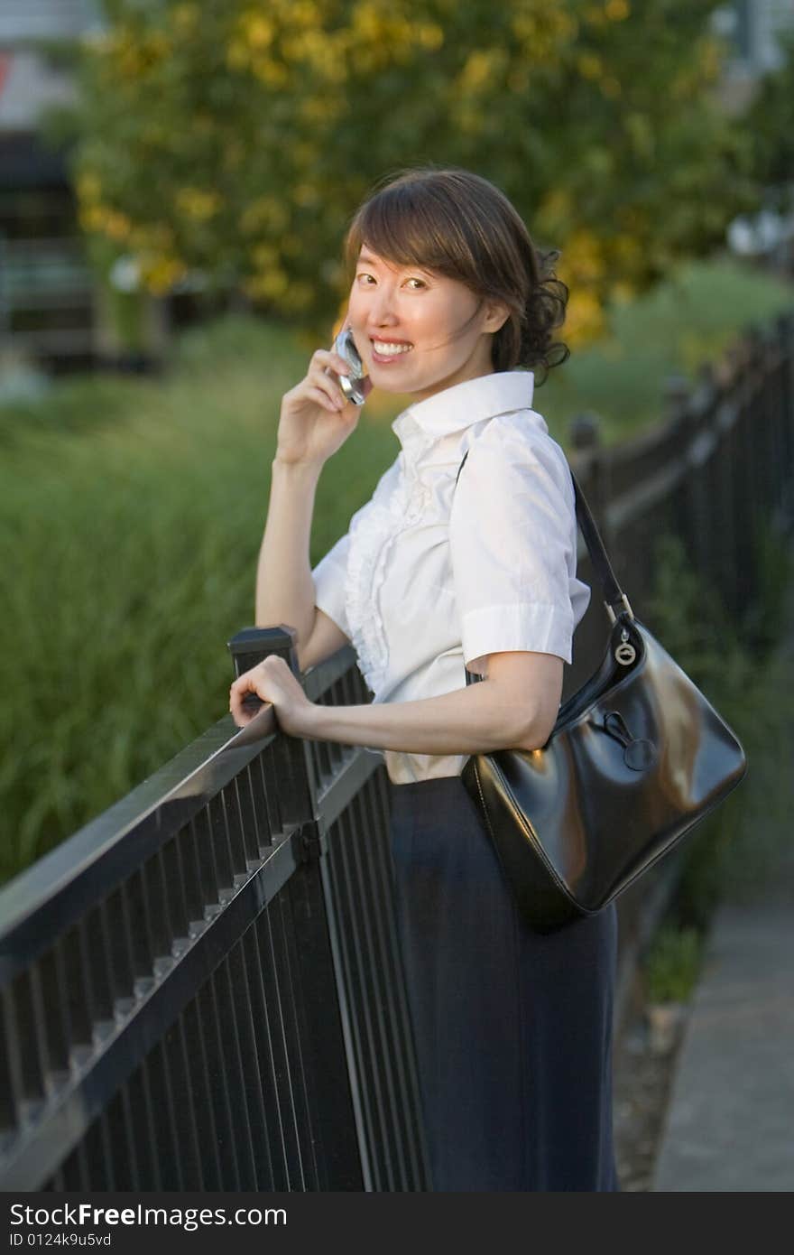 Woman Talking on Cell Phone - vertical