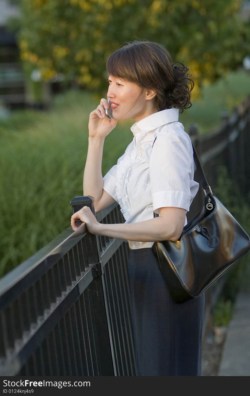 Woman Talking on Cellular Phone - vertical