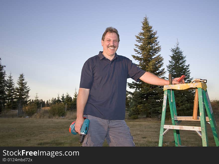 Man with Ladder - Horizontal