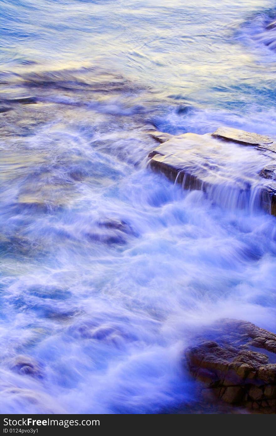 Wave washing on rocks