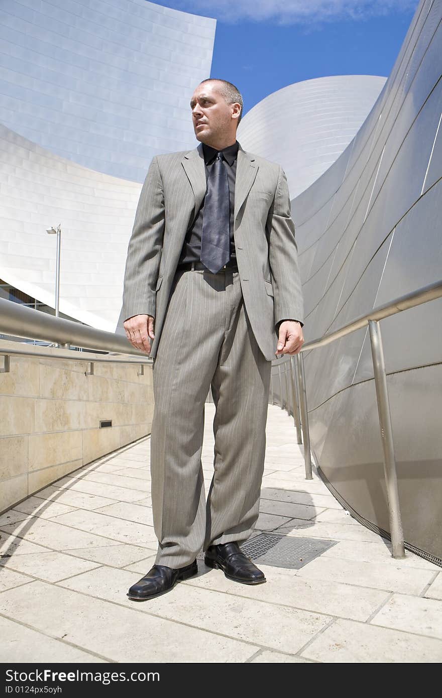 Handsome  Male Model Posing outdoors, downtown. Handsome  Male Model Posing outdoors, downtown