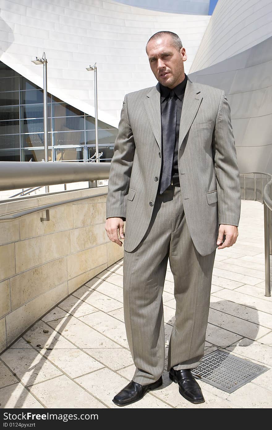 Handsome  Male Model Posing outdoors, downtown. Handsome  Male Model Posing outdoors, downtown