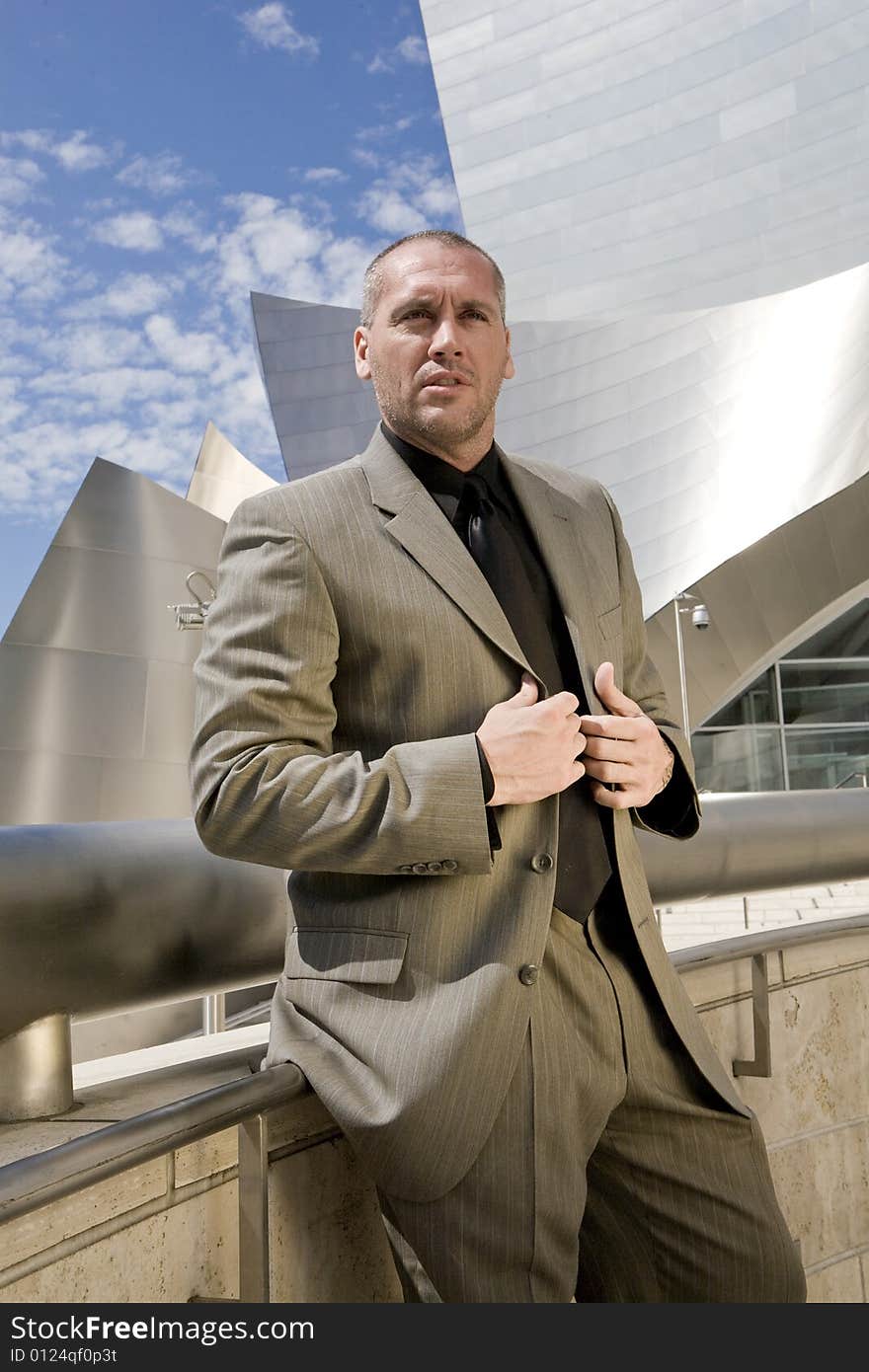 Handsome  Male Model Posing outdoors, downtown. Handsome  Male Model Posing outdoors, downtown