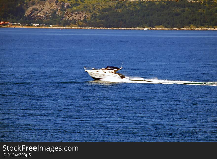 Speed-boat Over Blue Sea