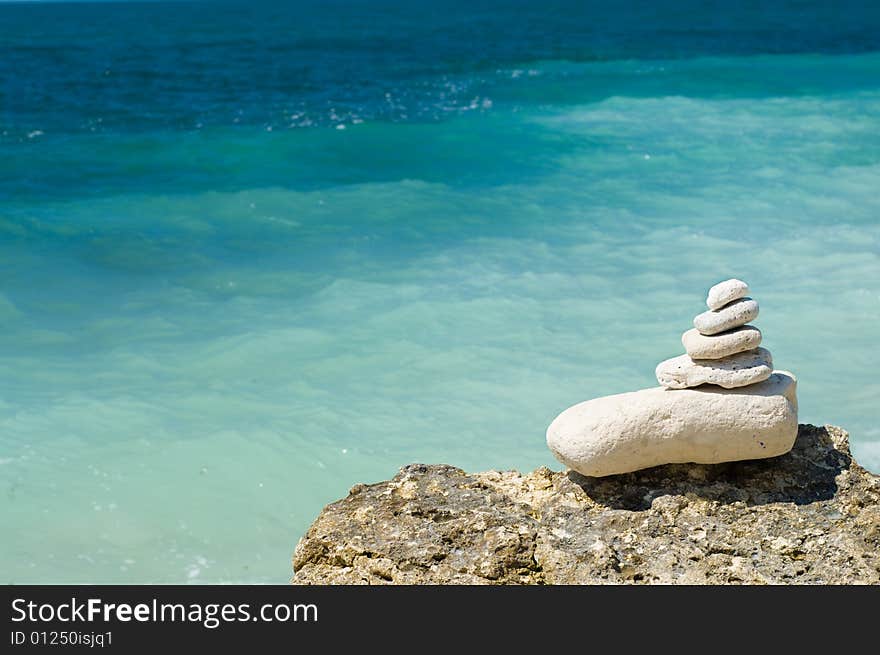 Stacked Pebbles On The Beach