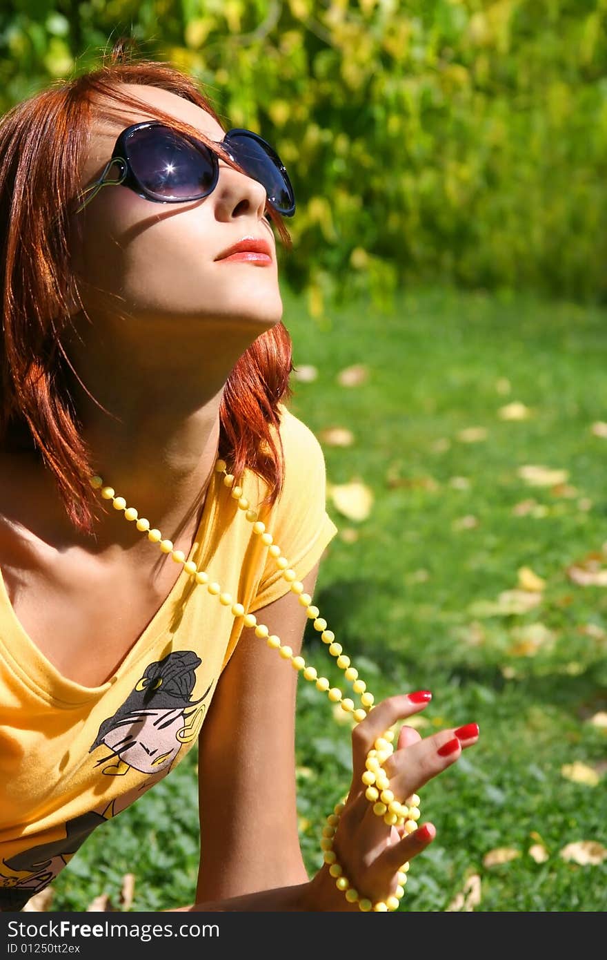 Funny young girl relaxing outdoors. Funny young girl relaxing outdoors