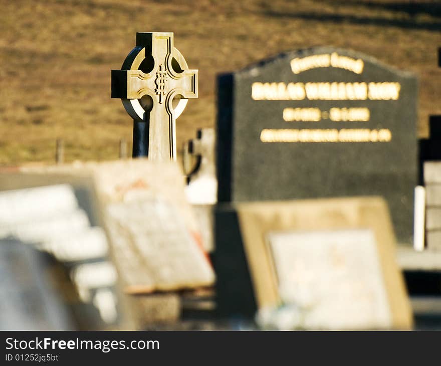 This is a rural grave yard and this head stone stood in back baically all alone. This is a rural grave yard and this head stone stood in back baically all alone.