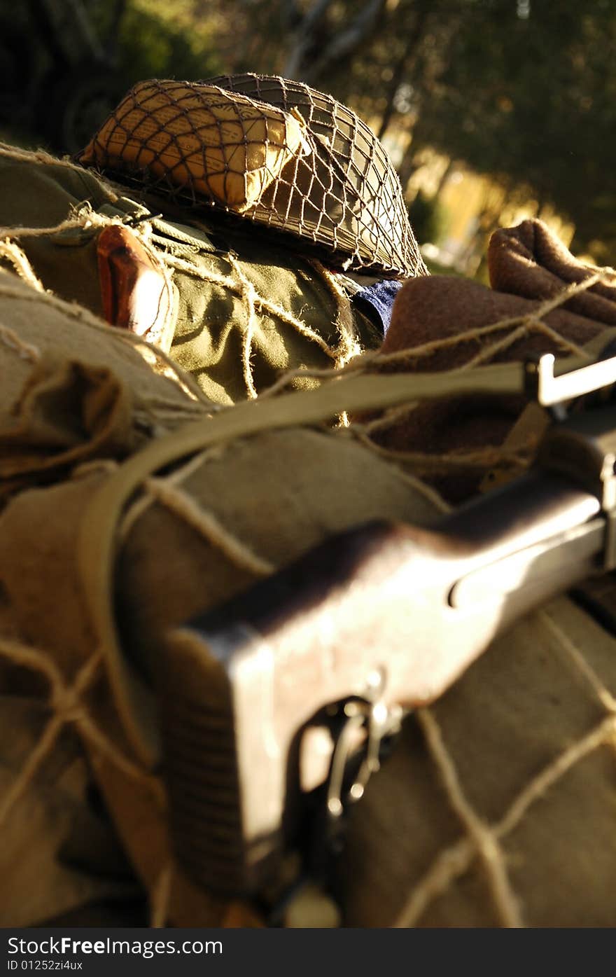 Helmet and gun on the motor-cycle. Helmet and gun on the motor-cycle