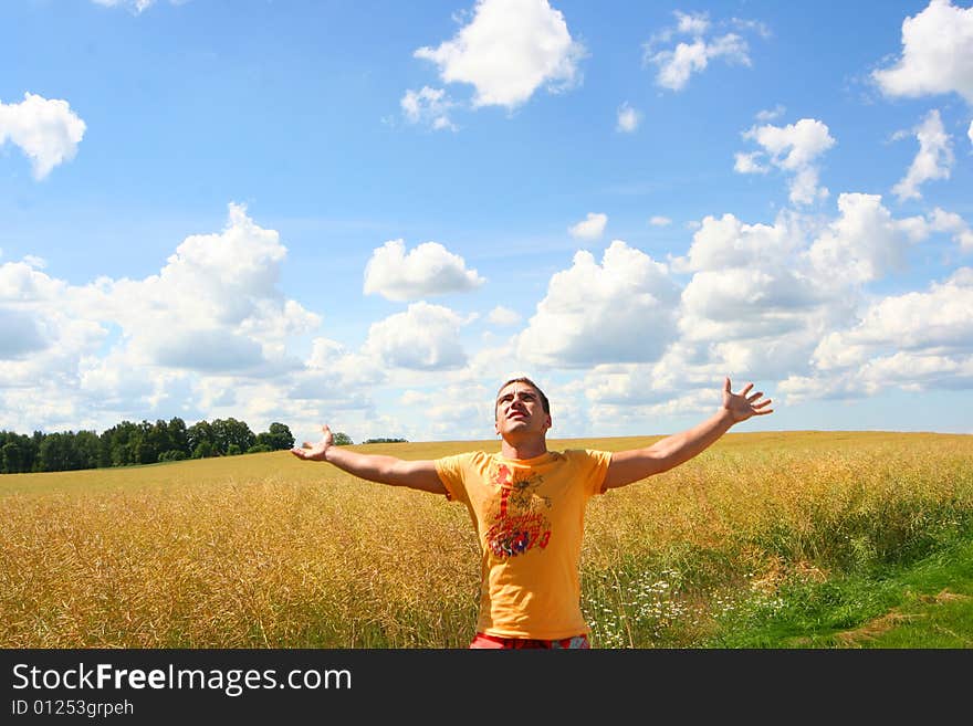 Cute young guy relaxing outdoors. Cute young guy relaxing outdoors