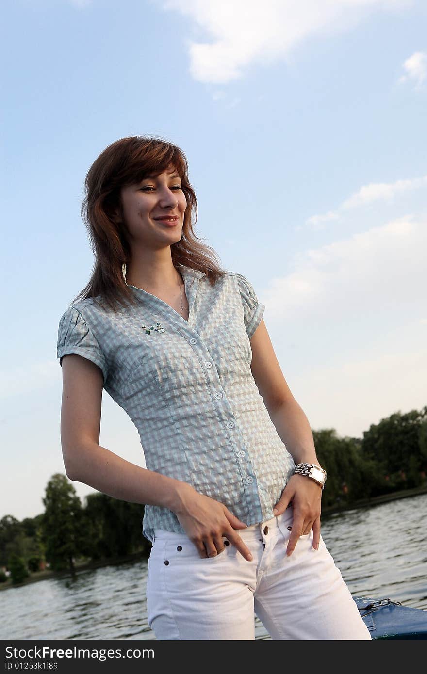 Girl standing on a boat