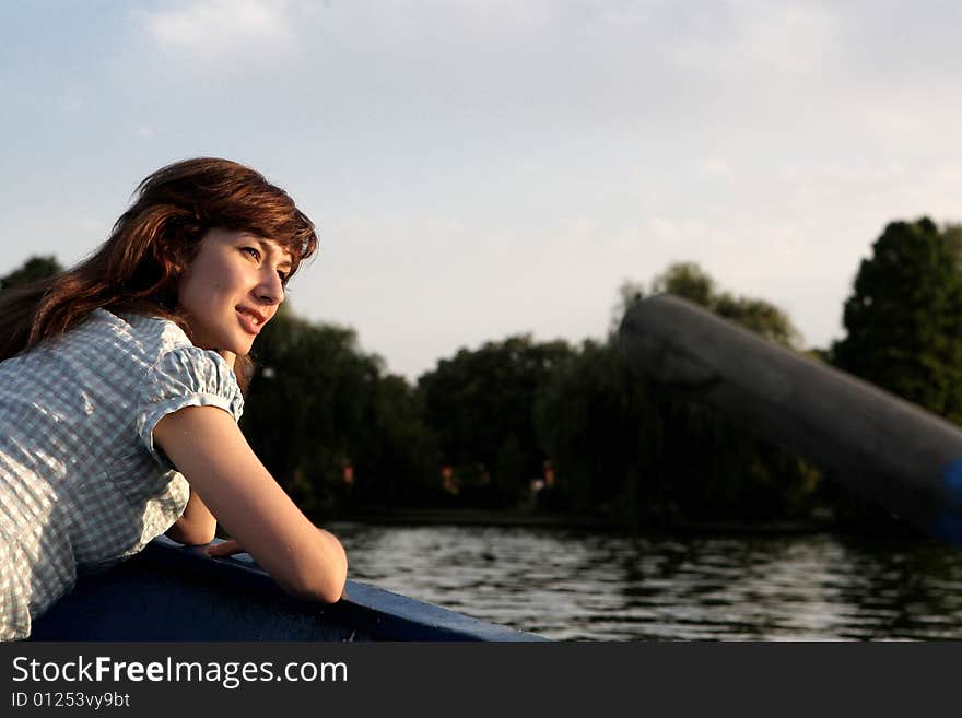 Girl posing on a boat