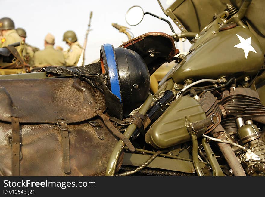 Helmet and gun on the motor-cycle. Helmet and gun on the motor-cycle