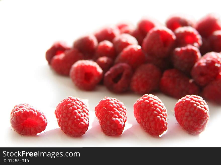 Background with fresh red raspberries. Background with fresh red raspberries