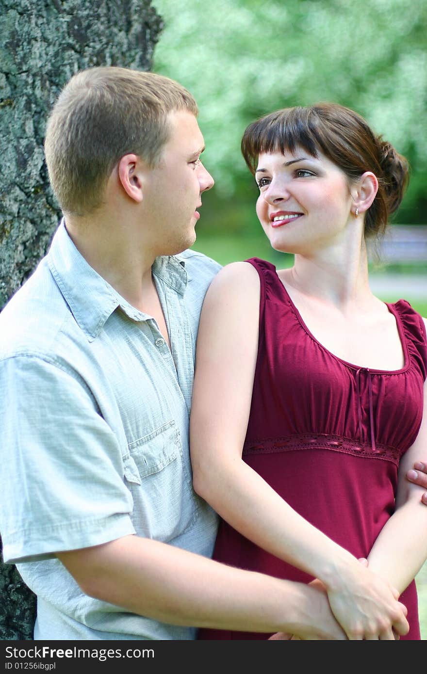 Happy young loving couple outdoors. Happy young loving couple outdoors