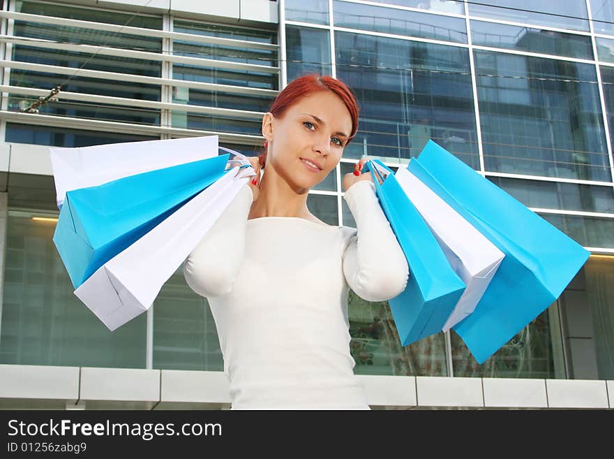 Young woman with shopping bags. Young woman with shopping bags