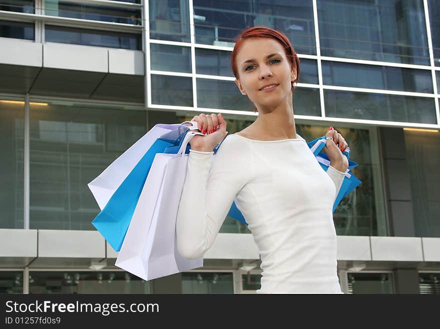 Young woman with shopping bags. Young woman with shopping bags