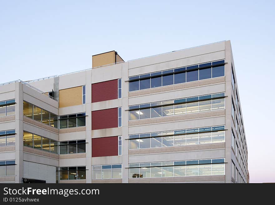 An office building with a empty parking lot