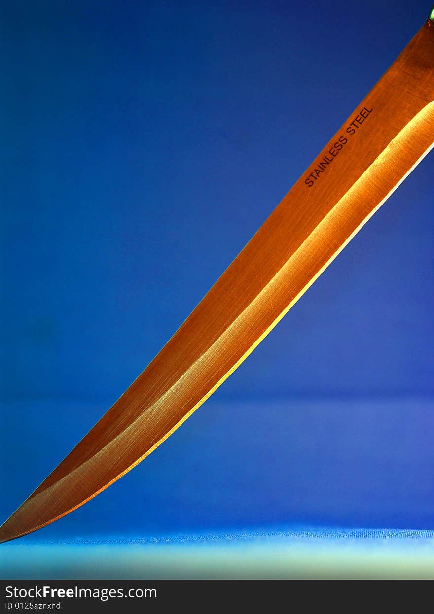 Stainless Steel and its sharpness can be seen by various light reflections on the blade and the knife. Stainless Steel and its sharpness can be seen by various light reflections on the blade and the knife.