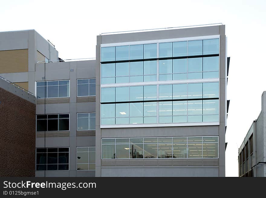 An office building with a empty parking lot